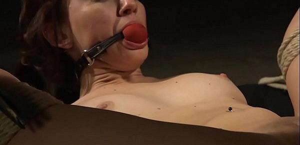  Gagged and clamped lesbian gets anal
